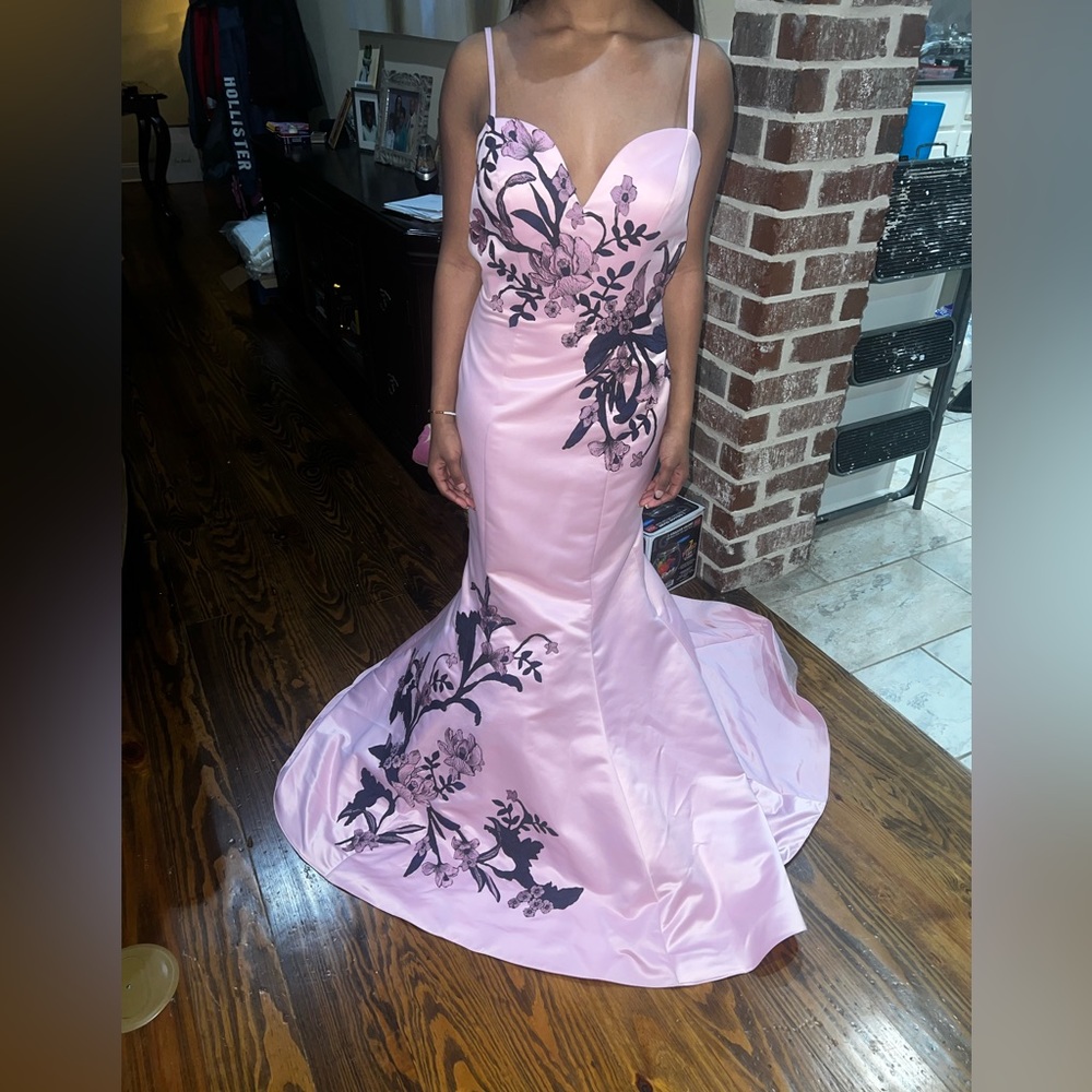 Brand new with tags. Size 2 pink floral low back dress